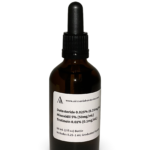 Amber glass bottle containing a Dutasteride Minoxidil Tretinoin solution with black bulb graduated pipette