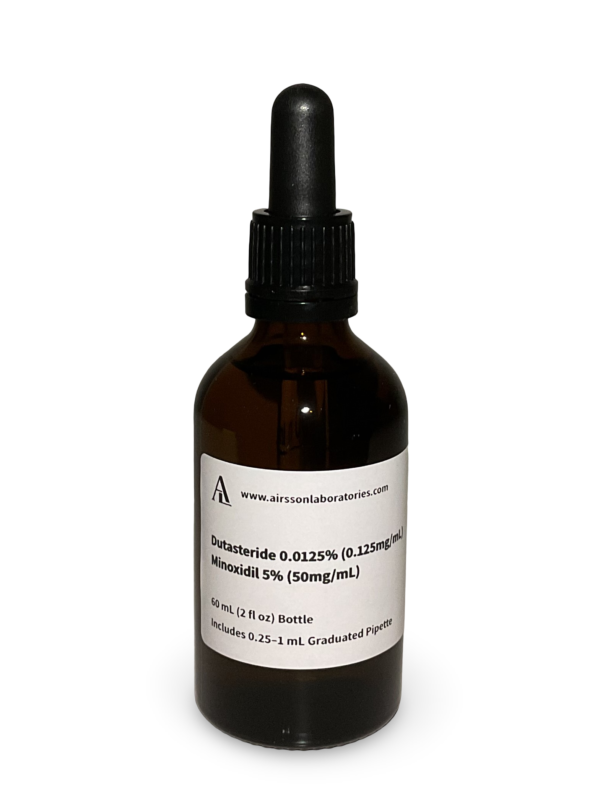 Amber glass bottle containing a Dutasteride and Minoxidil solution with black bulb graduated pipette