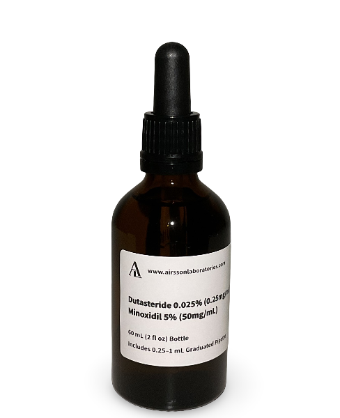 Amber glass bottle containing a Dutasteride and Minoxidil solution with black bulb graduated pipette