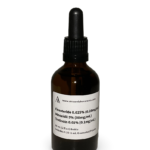 Amber glass bottle containing a Finasteride, Minoxidil and Tretinoin solution with black bulb graduated pipette